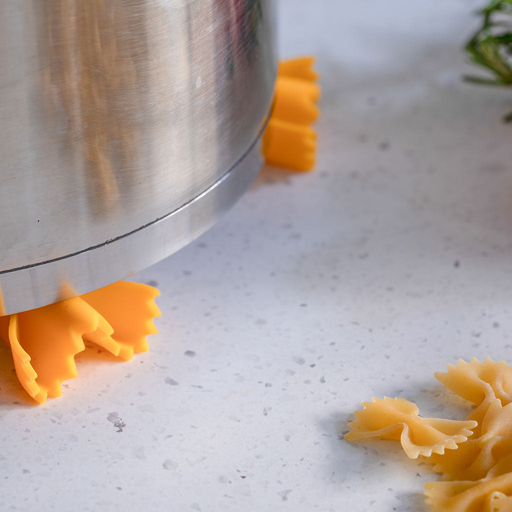 farfalle steam releaser and trivet shaped like pasta
by Monkey Business