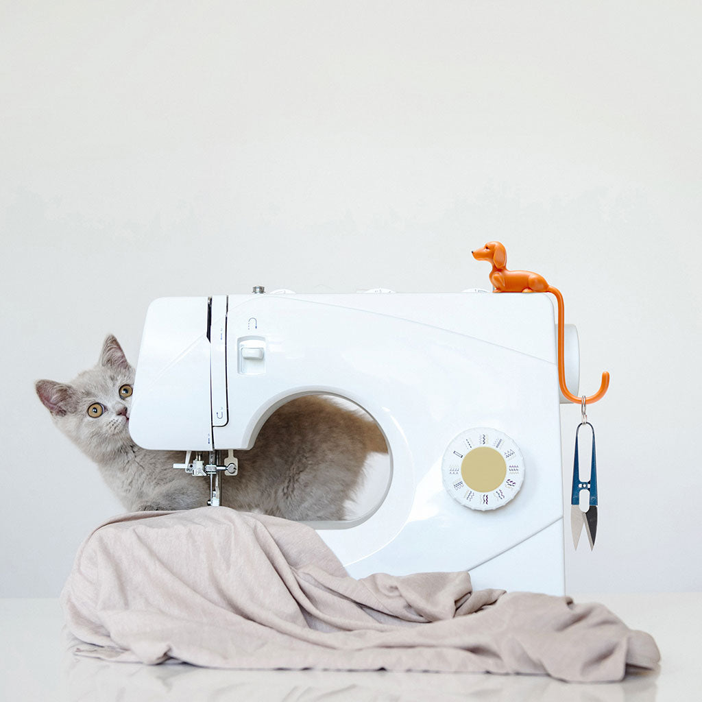 Rusty adhesive screen hook for headphones and keys by Monkey Business